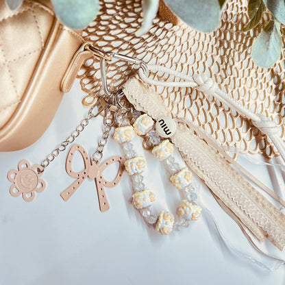HANDMADE BAG CHARMS ~ BEIGE BOW/HAPPY FACE ~