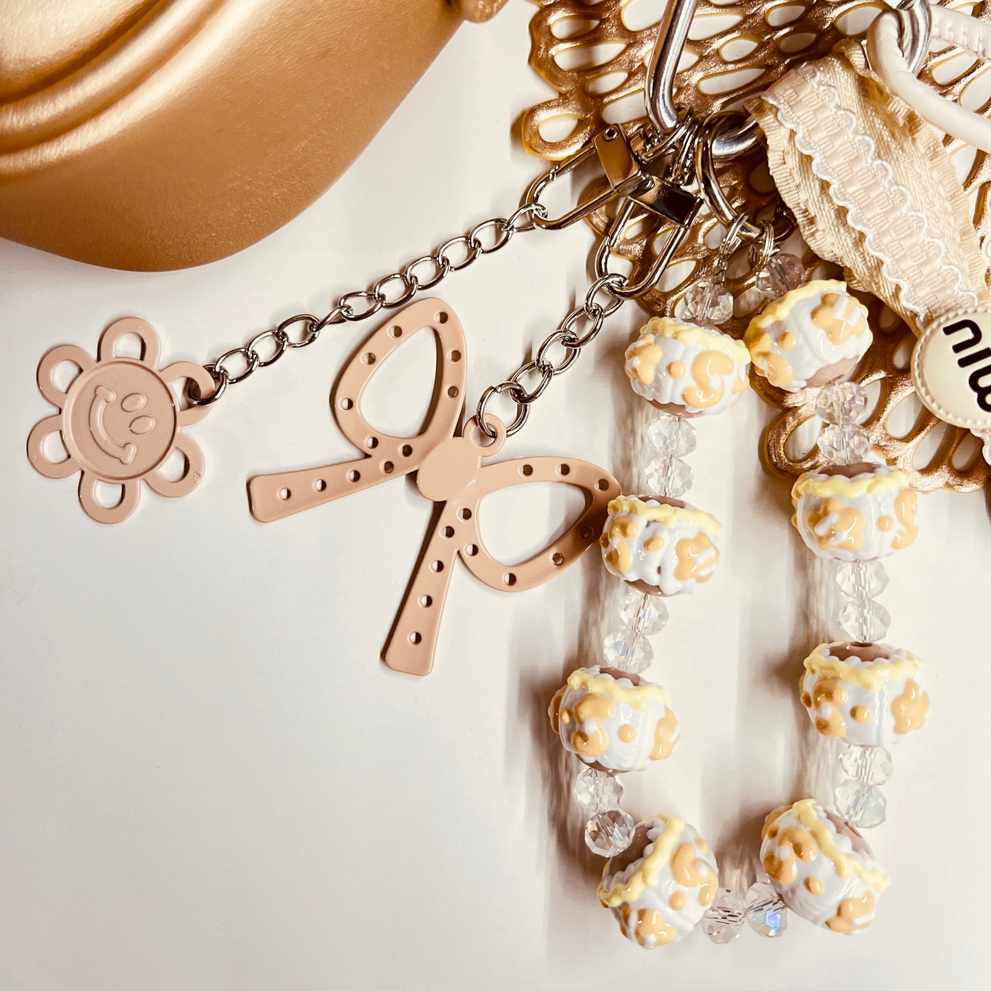 HANDMADE BAG CHARMS ~ BEIGE BOW/HAPPY FACE ~